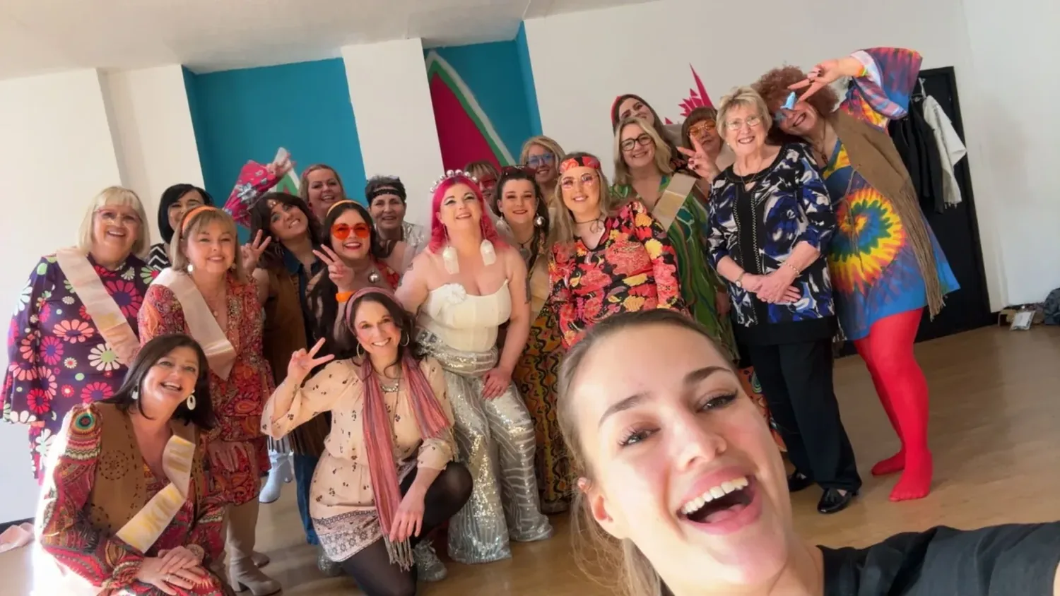 Hen party group dancing to ABBA together at a class in Exeter