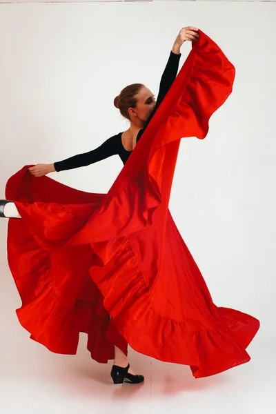 Adults learning flamenco at a weekly dance class in Exeter